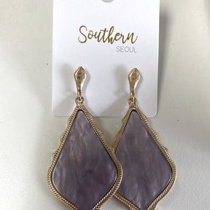 Purple with gold earrings. Never worn. New. Great quality. Southern Seoul